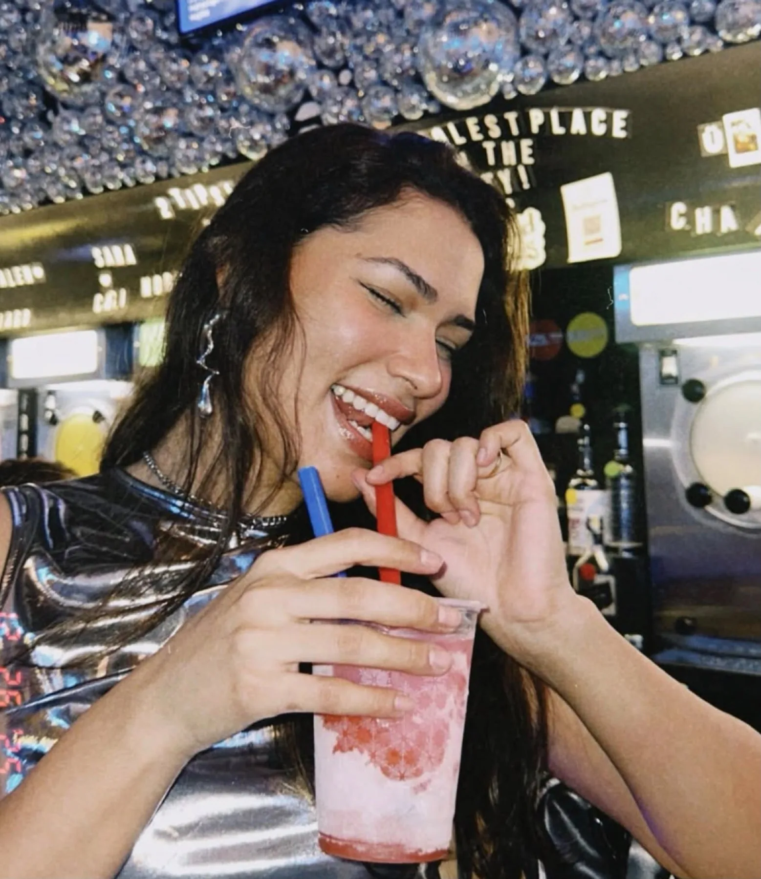 A guest enjoying a FÜBAR frozen cocktail